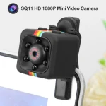 Cámara SQ11 Mini DV 1080p mostrando su tamaño compacto